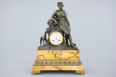 A Charles X patinated bronze and Siena marble striking mantel clock, ca. 1820-30, France